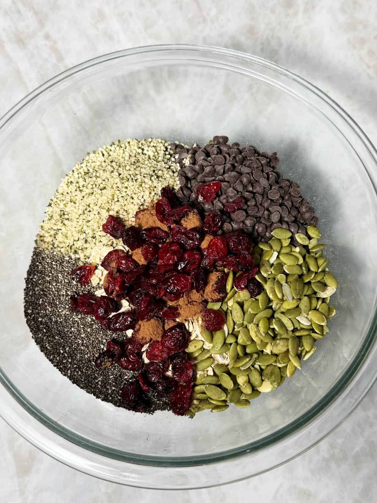 ingredients for granola bars in a bowl 