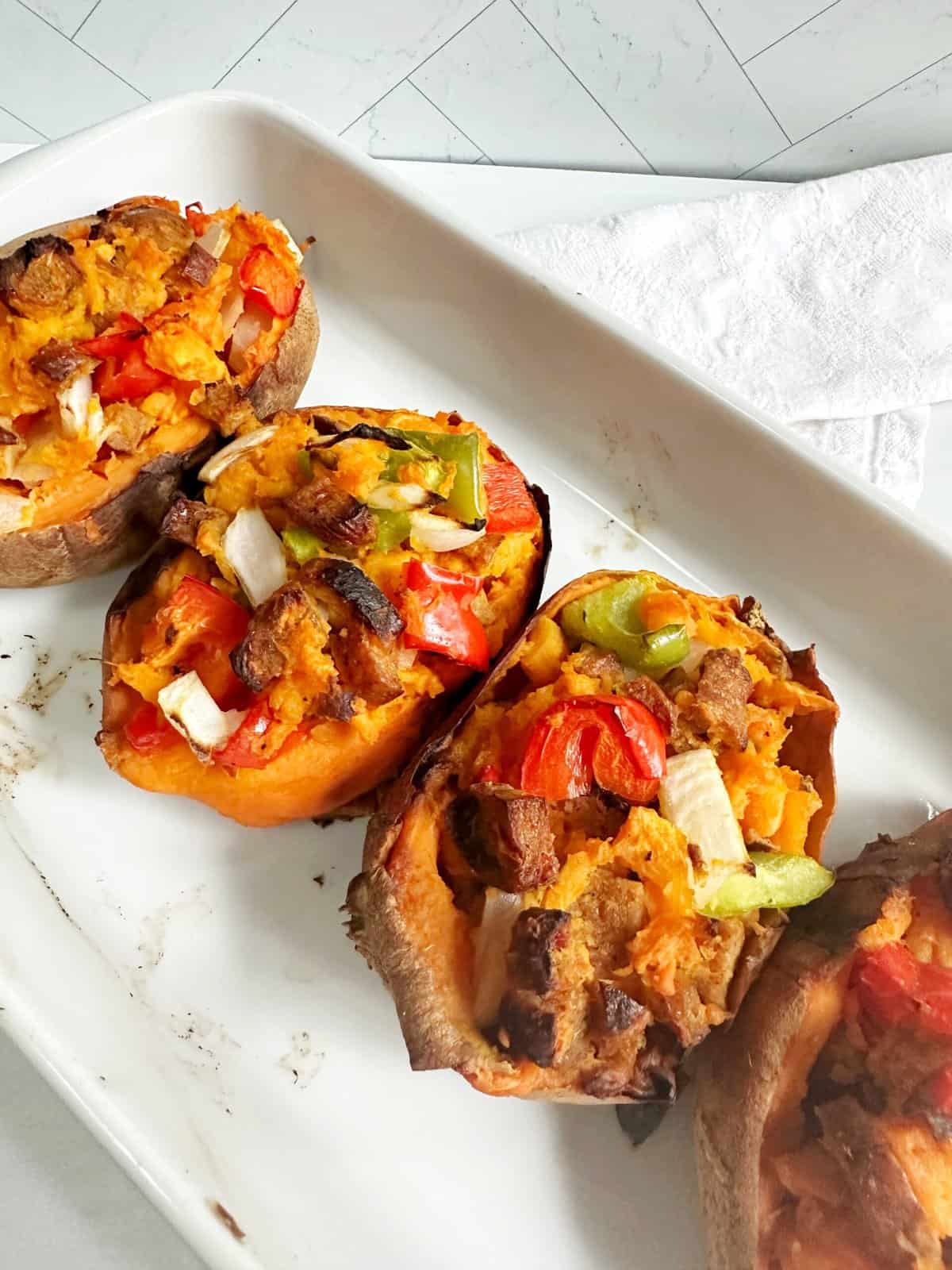 sweet potatoes stuffed with sausage and vegetables 