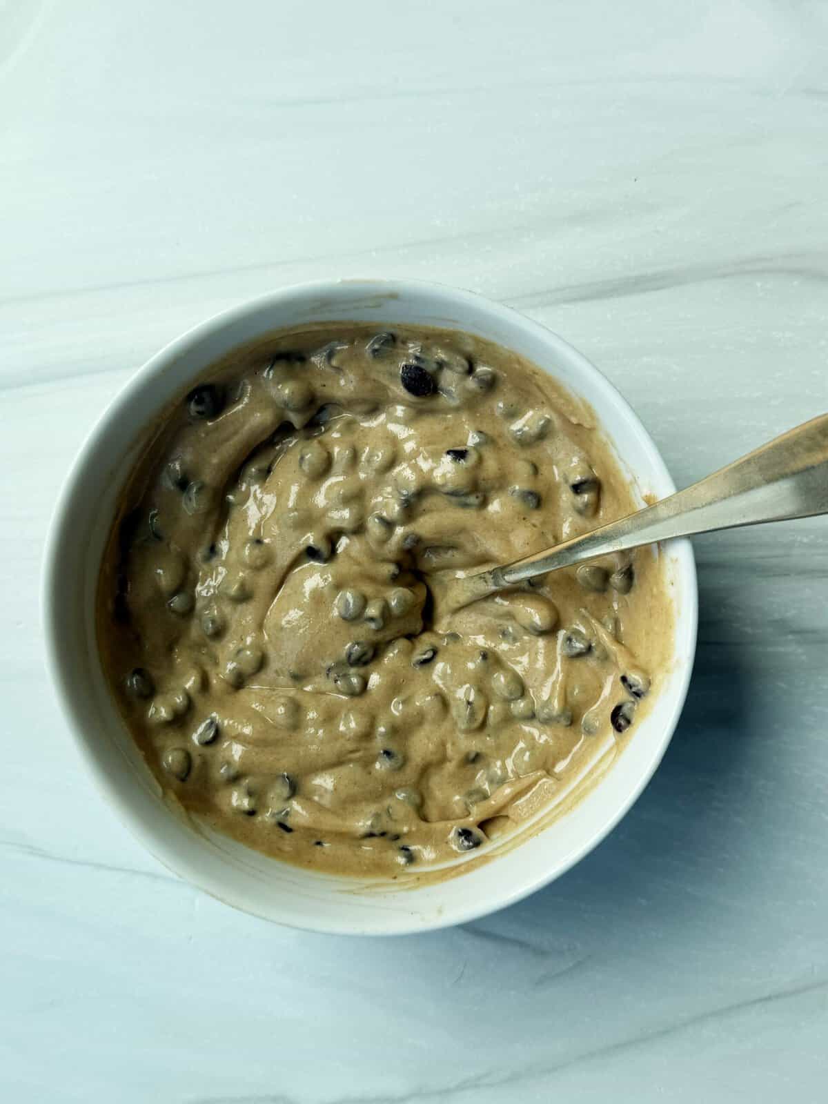 dip in a bowl with a spoon
