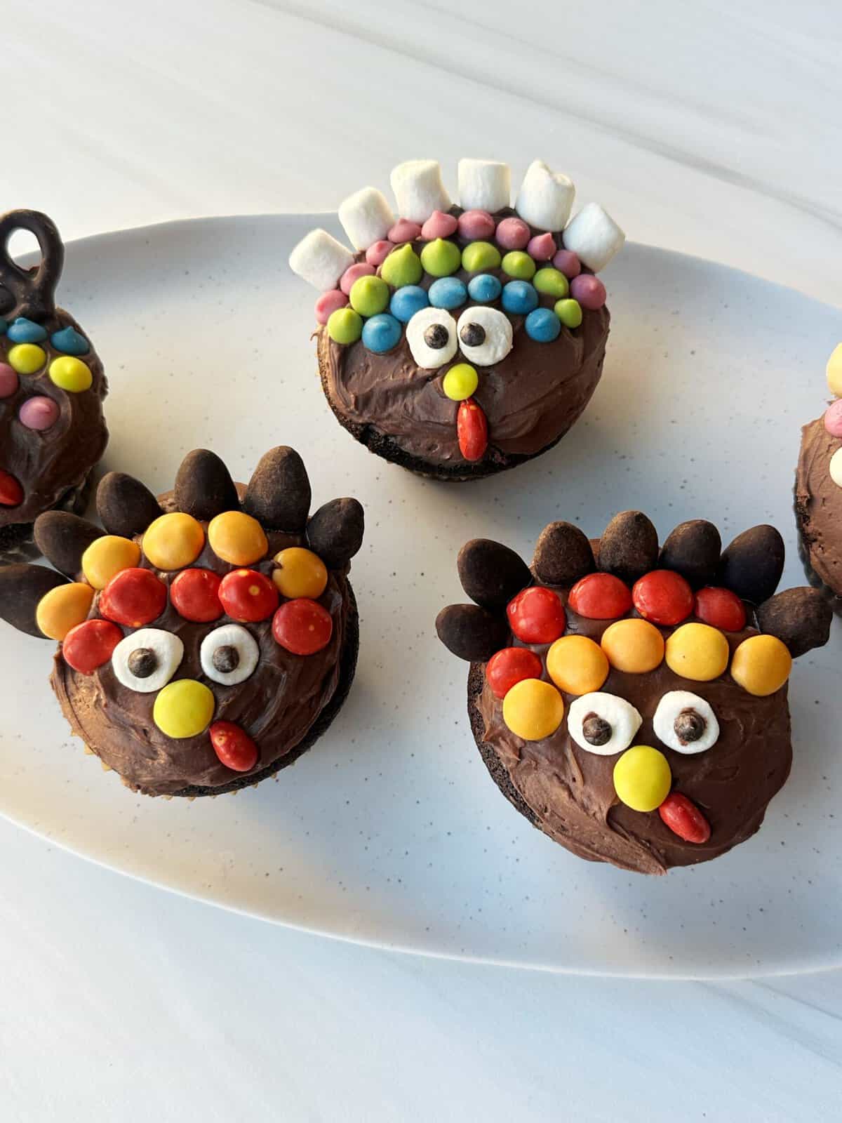 adorable turkey cupcakes with candy faces 