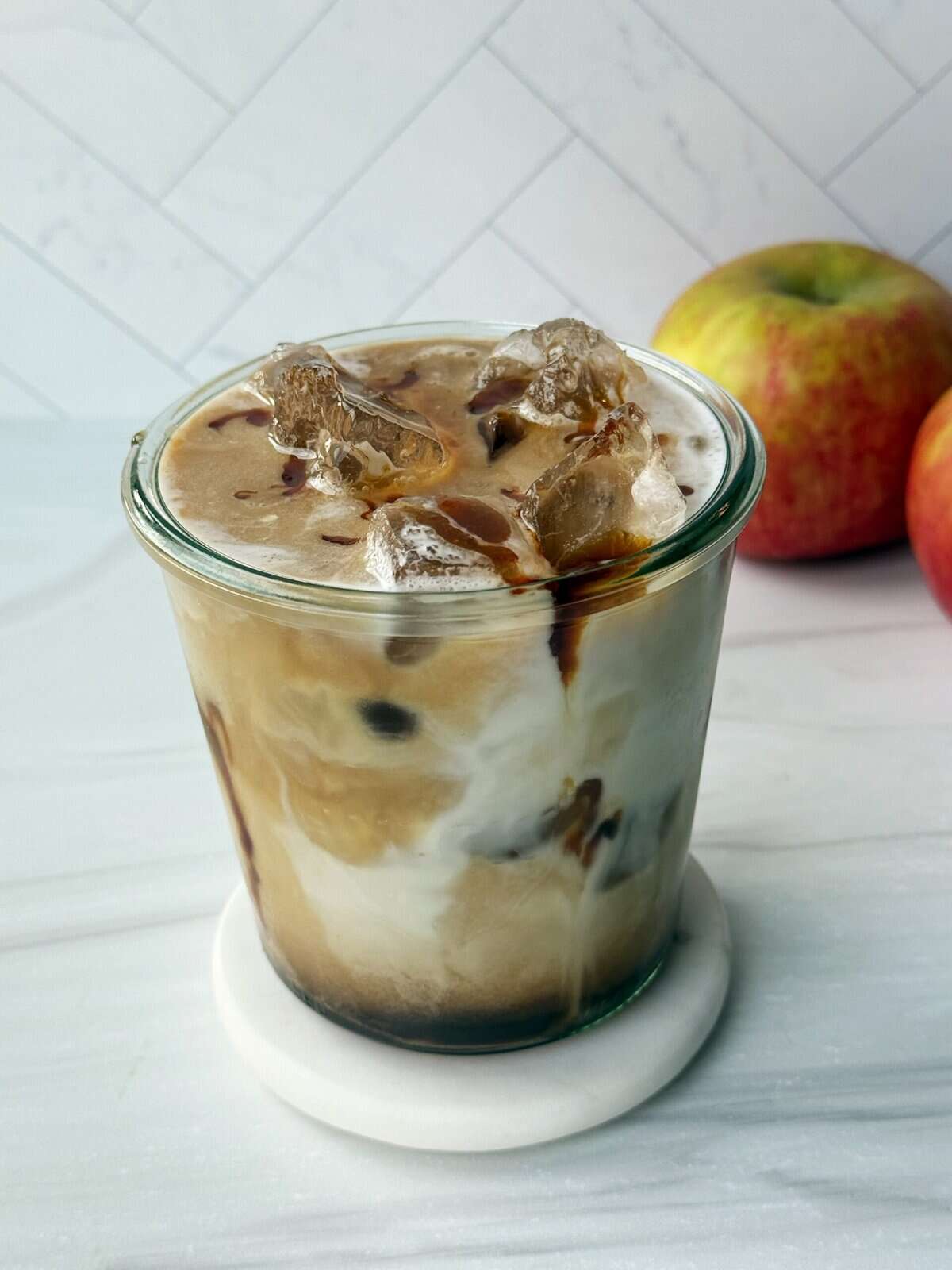 apple macchiato drink next to apples