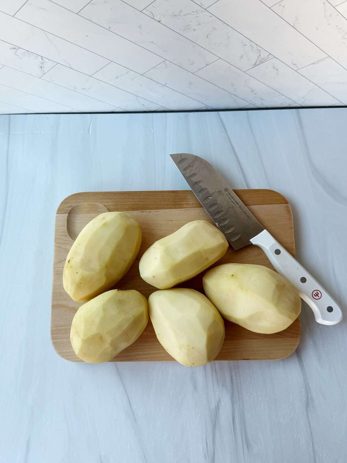potatoes on a cutting board