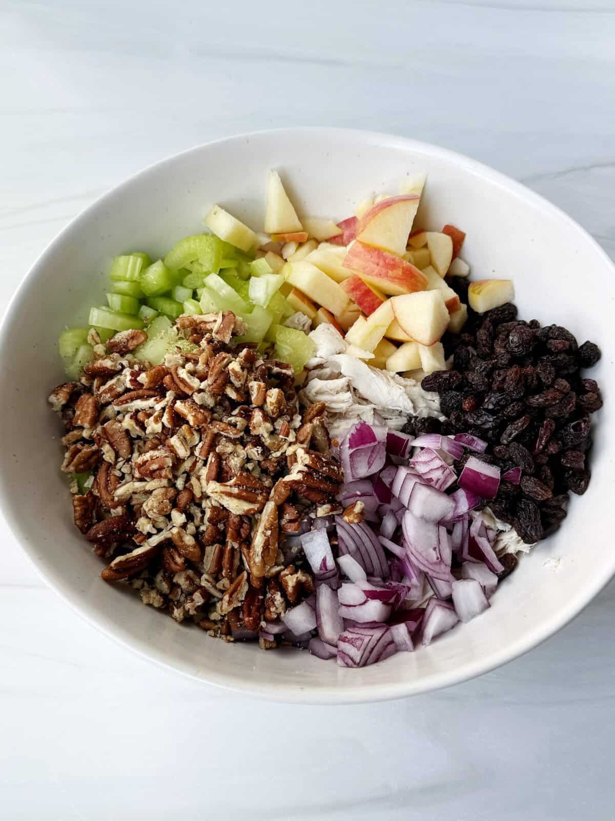 fall chicken salad ingredients in a bowl