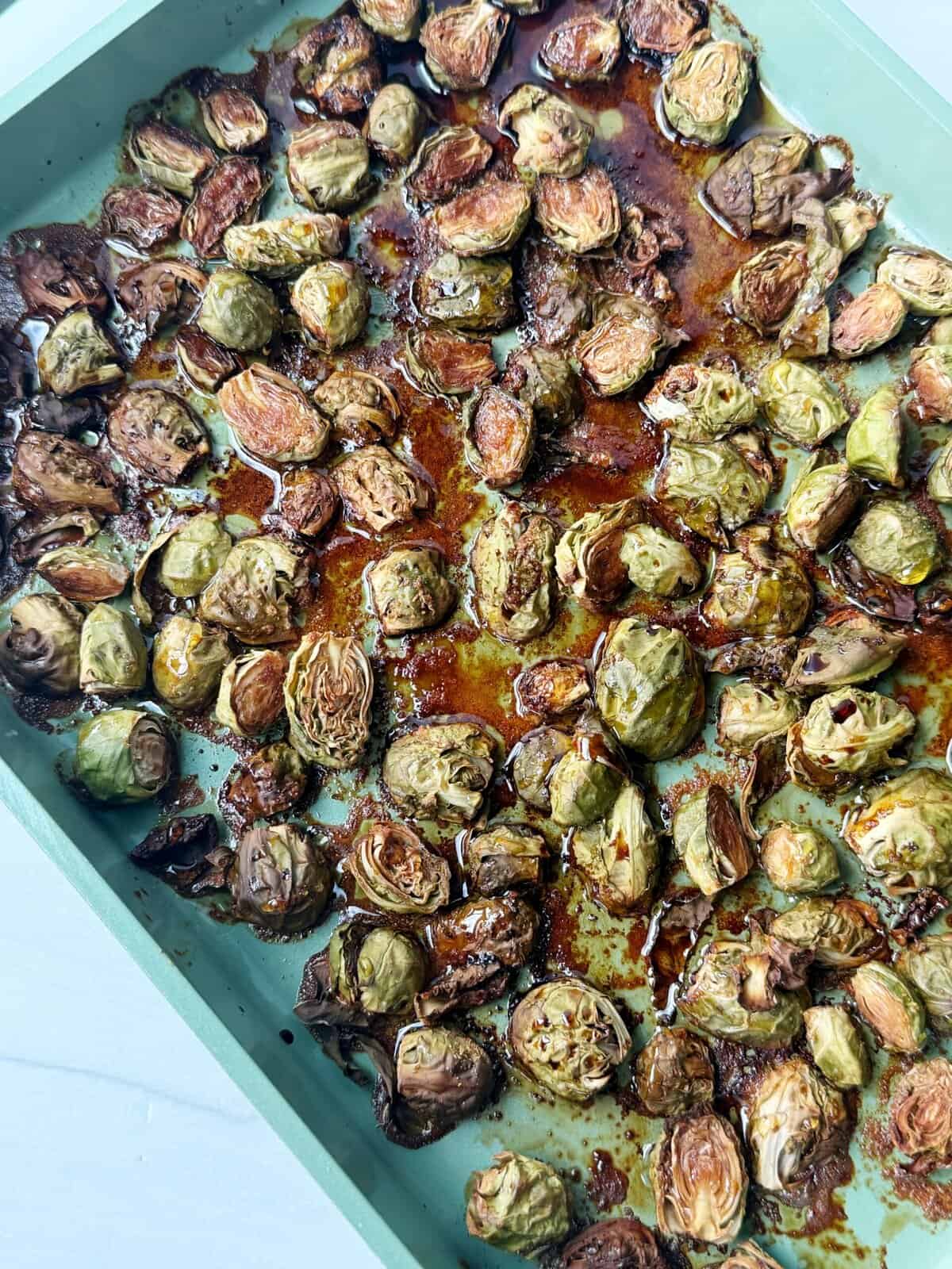 balsamic vinegar drizzled over roasted brussels sprouts
