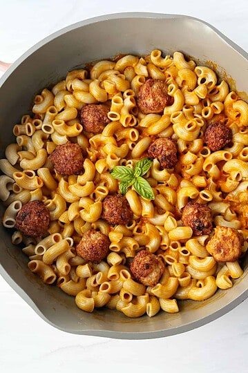 pan of pasta with sauce and meatballs