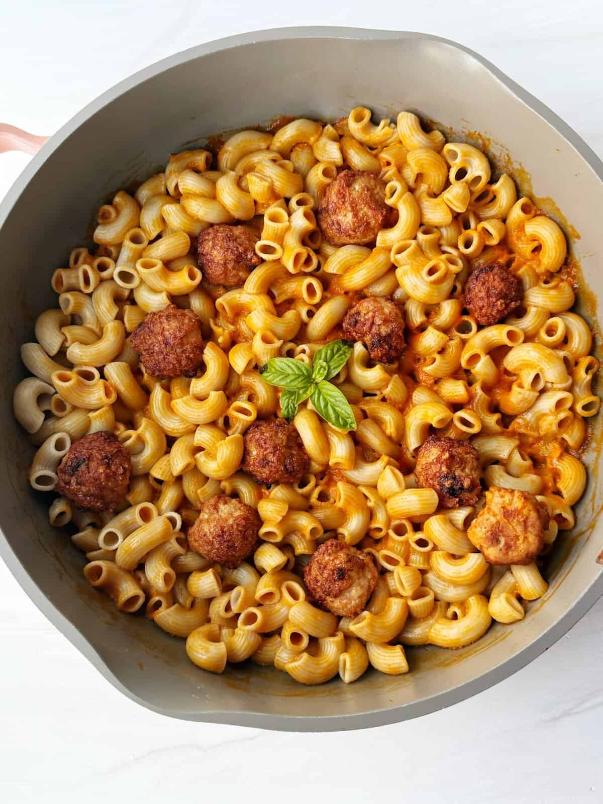 pan of pasta with sauce and meatballs