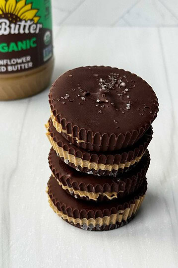 stack of sunbutter cups with jar