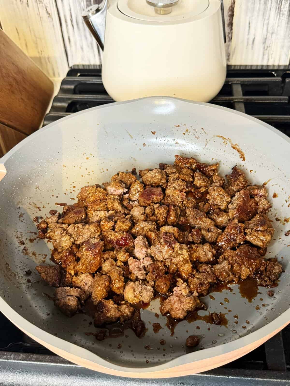 juicy ground beef in a pan