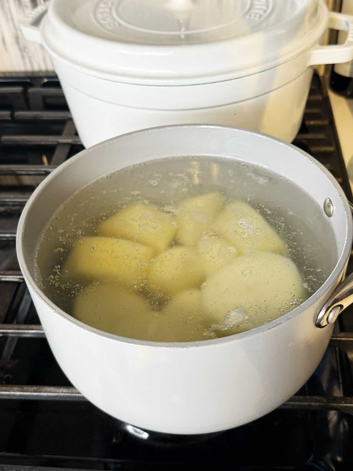 potatoes in a boiling pot of water