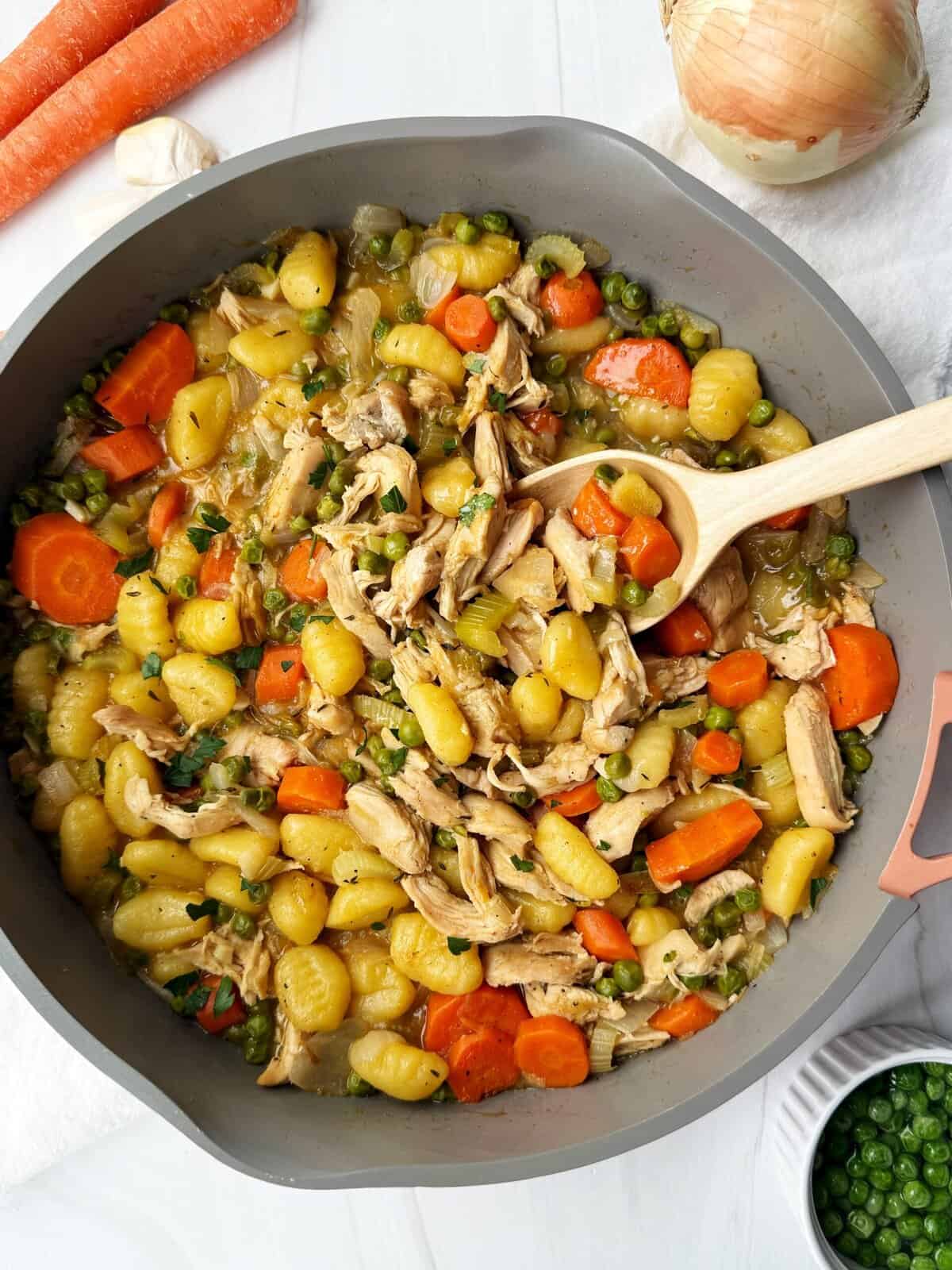 chicken pot pie gnocchi in a pan