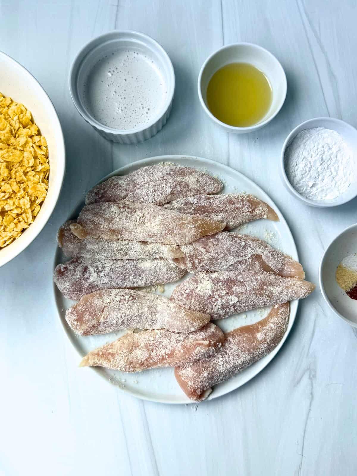 chicken tenders dipped in flour 