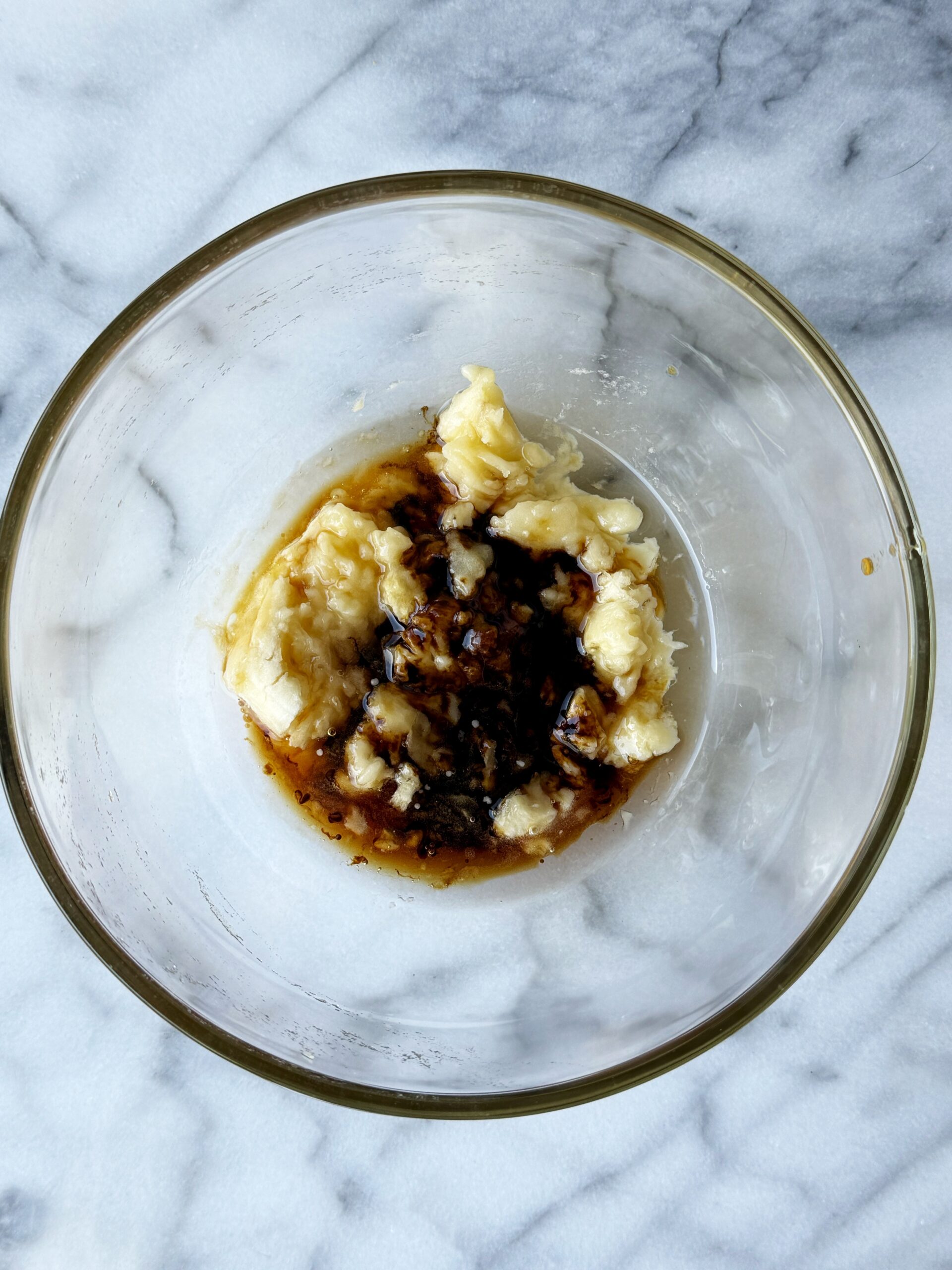 wet ingredients in a bowl for banana bread cookies 