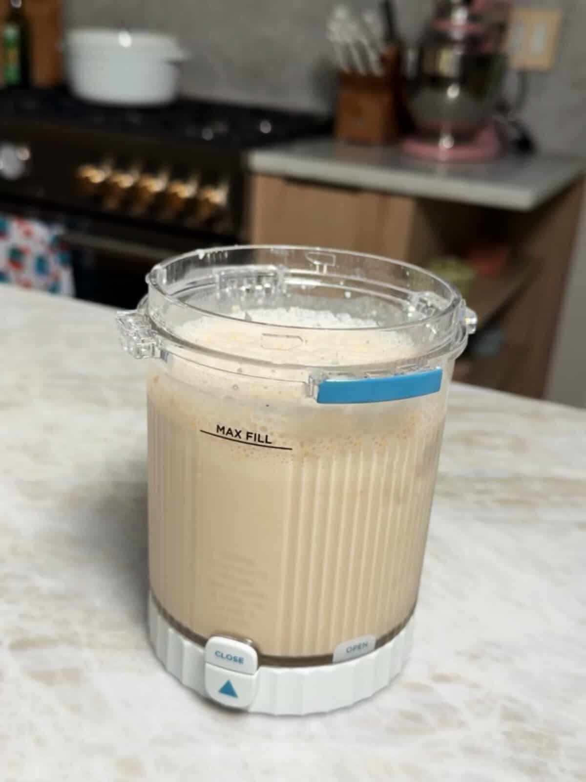 vanilla creami ingredients in a creami tub ready to be frozen