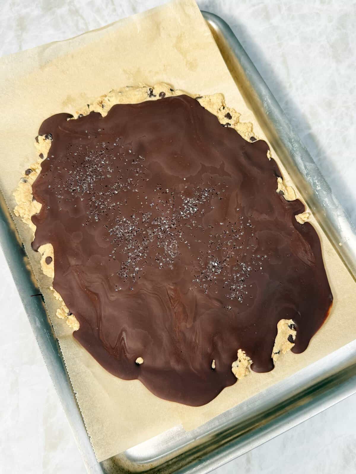 frozen protein cookie dough bark with chocolate on top 