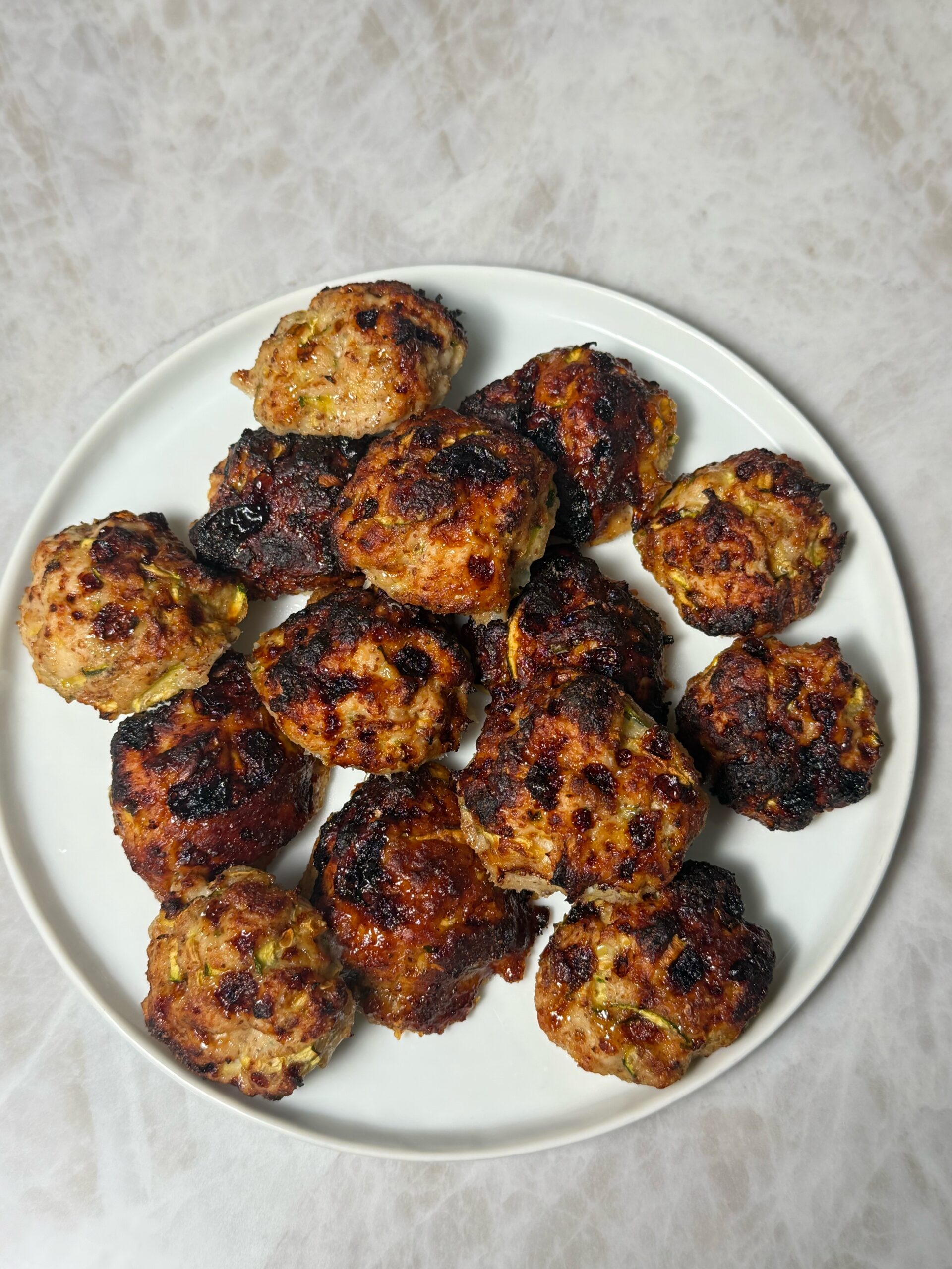 gluten-free chicken sausages on a plate