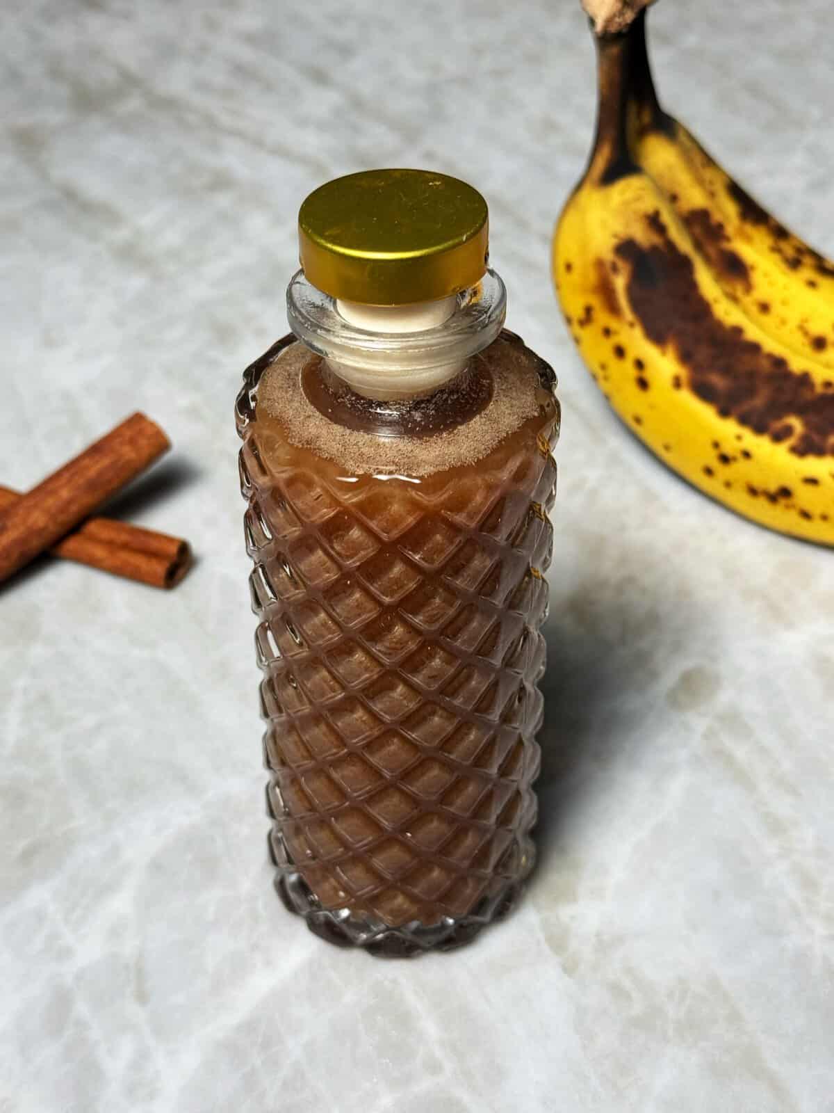 homemade banana bread syrup in a bottle