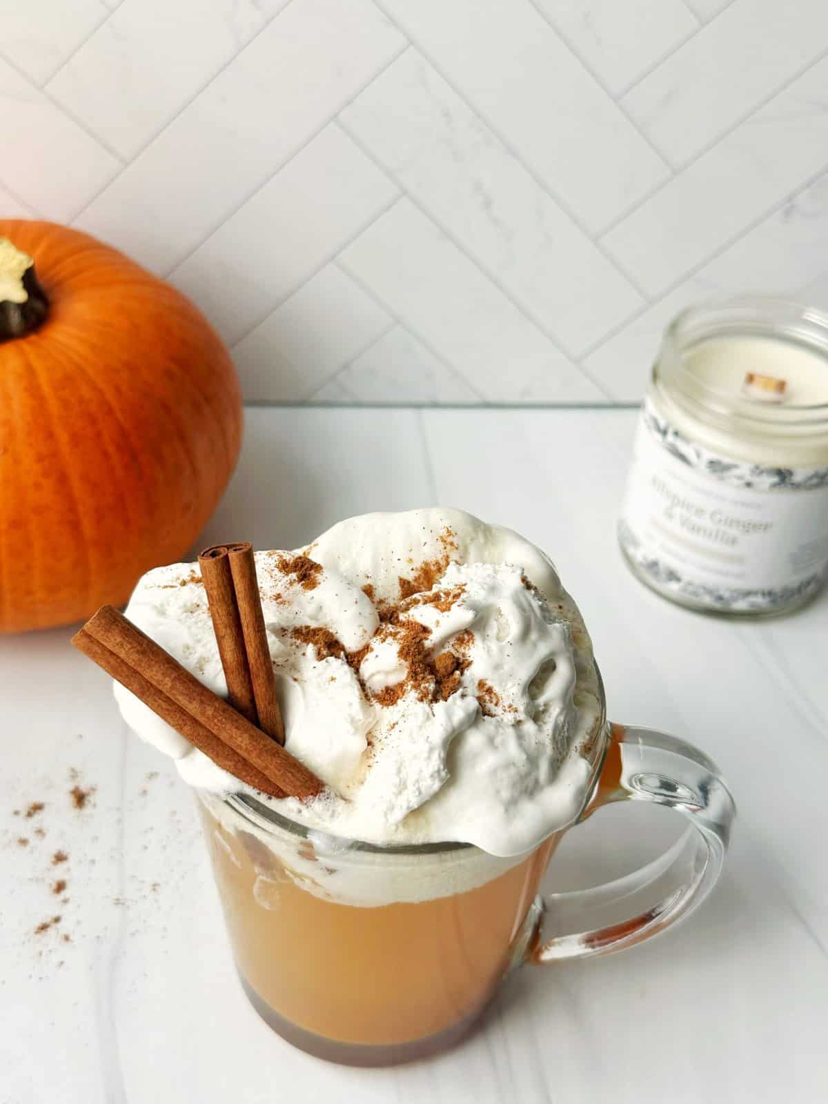 pumpkin cider in a glass mug
