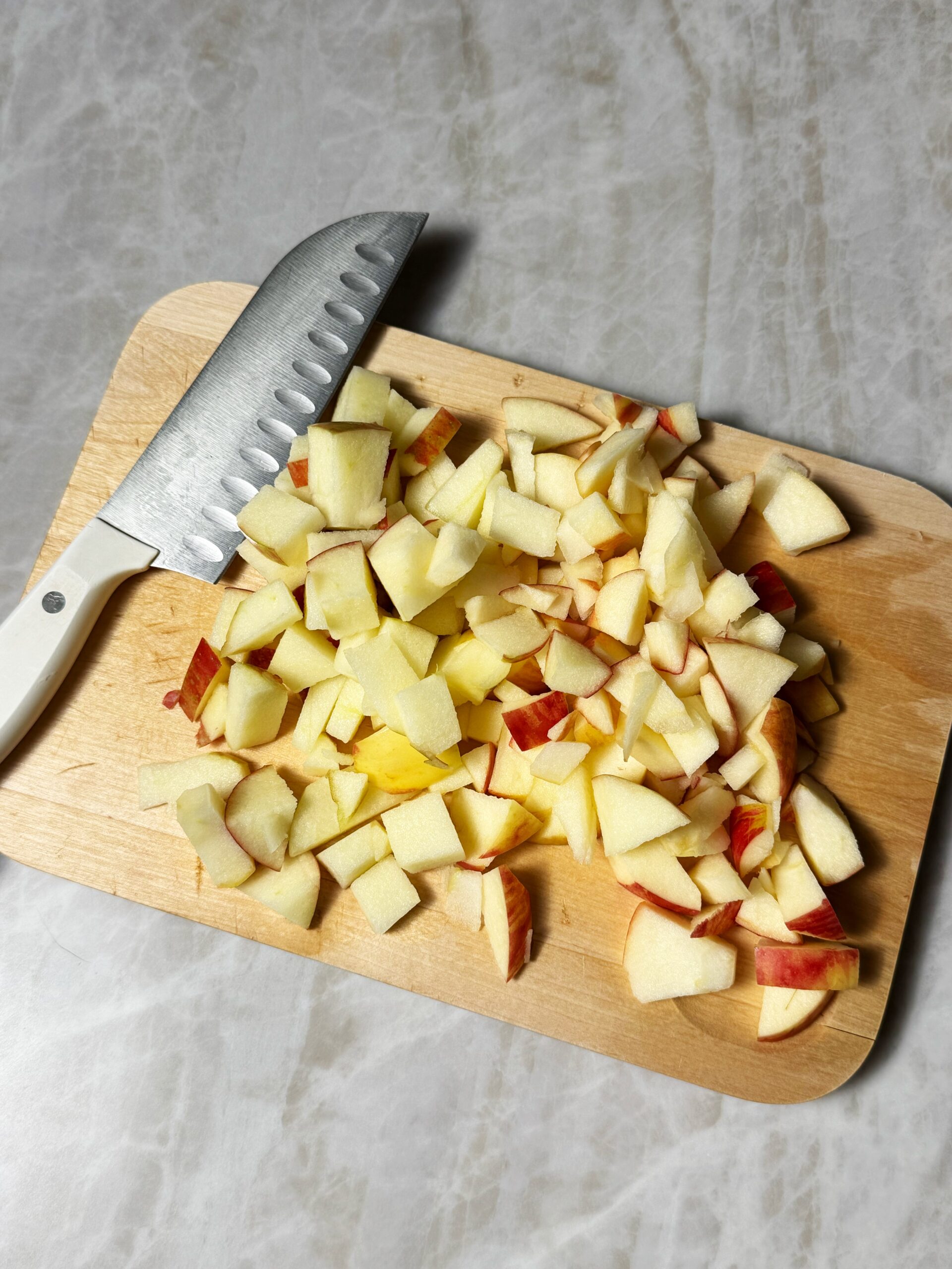 apples chopped on cutting board
